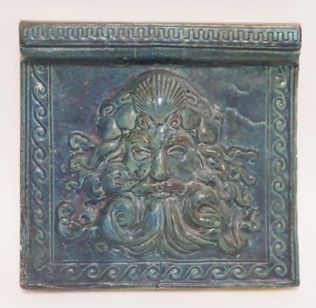 VINTAGE NORTHWIND TILE: VINTAGE TILE FEATURING A NORTHWIND FACE. 8 X 7 3/4 INCHES.