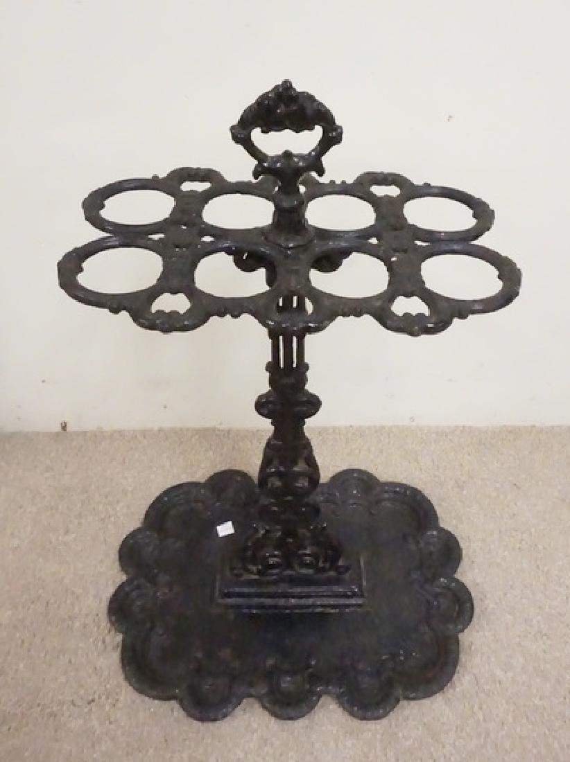 CAST IRON UMBRELLA STAND: ORNATE CAST IRON UMBRELLA STAND. 26 1/2 IN H