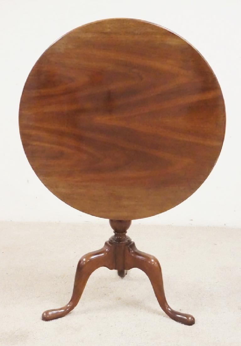 BIRDCAGE TILT TOP BREAKFAST TABLE: MAHOGANY BIRDCAGE TILT TOP BREAKFAST TABLE. 29 INCHES HIGH. 30 INCHES WIDE.