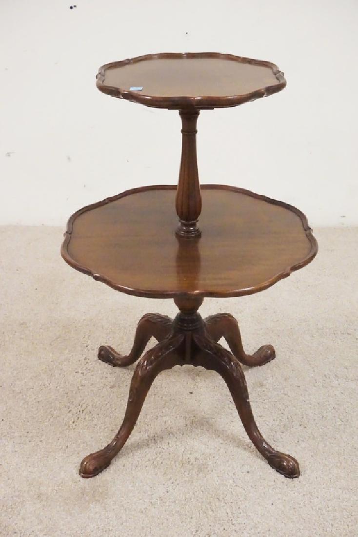 MAHOGANY 2 TIER TABLE: MAHOGANY 2 TIER TABLE. PIE CRUST TOPS. CARVED LEGS. 29 1/2 INCHES HIGH. 19 INCHES WIDE.