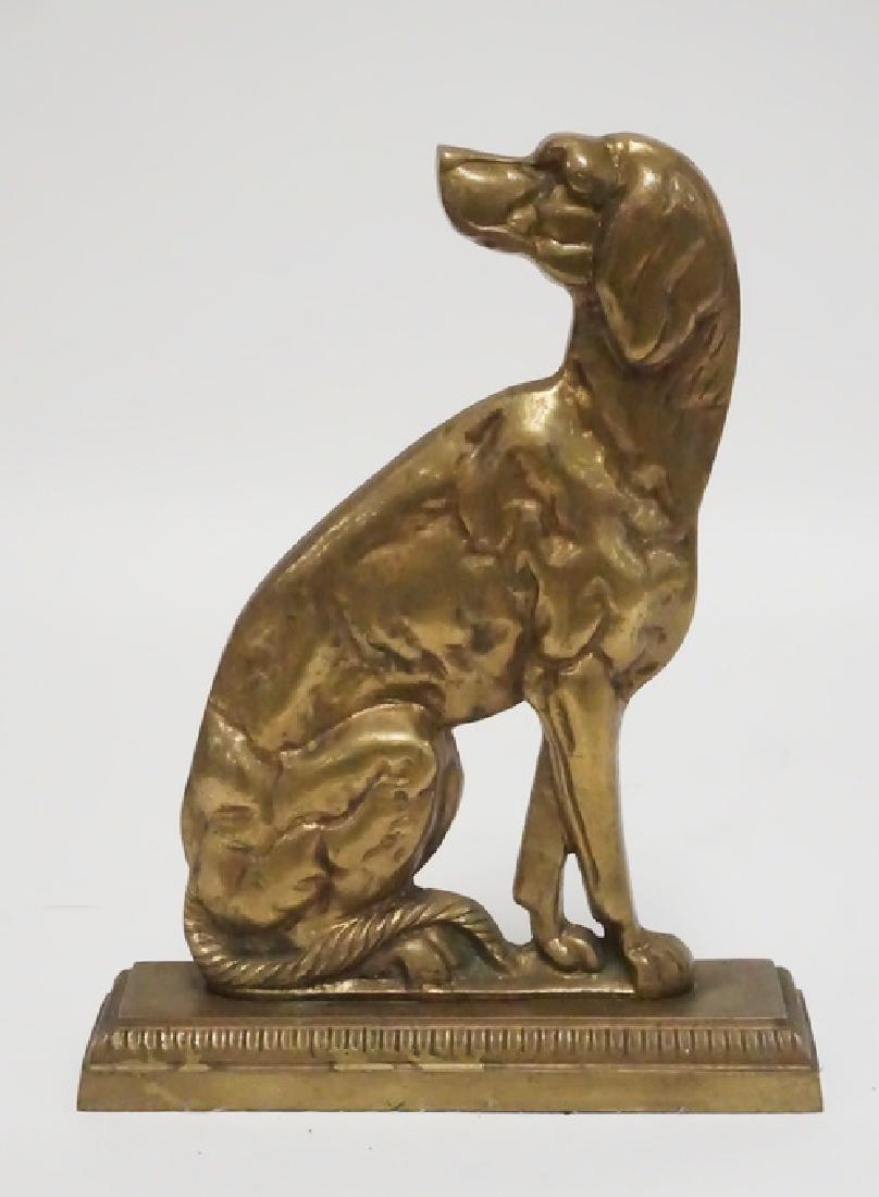 CAST BRASS DOG DOORSTOP: CAST BRASS DOG DOORSTOP. 12 INCHES HIGH.
