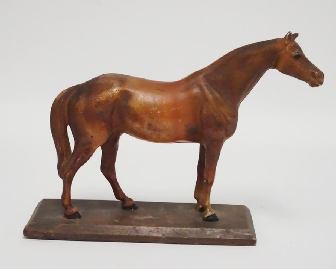 HUBLEY SORREL CAST IRON HORSE DOORSTOP: HUBLEY SORREL CAST IRON HORSE DOORSTOP. 7 3/4 INCHES HIGH.
