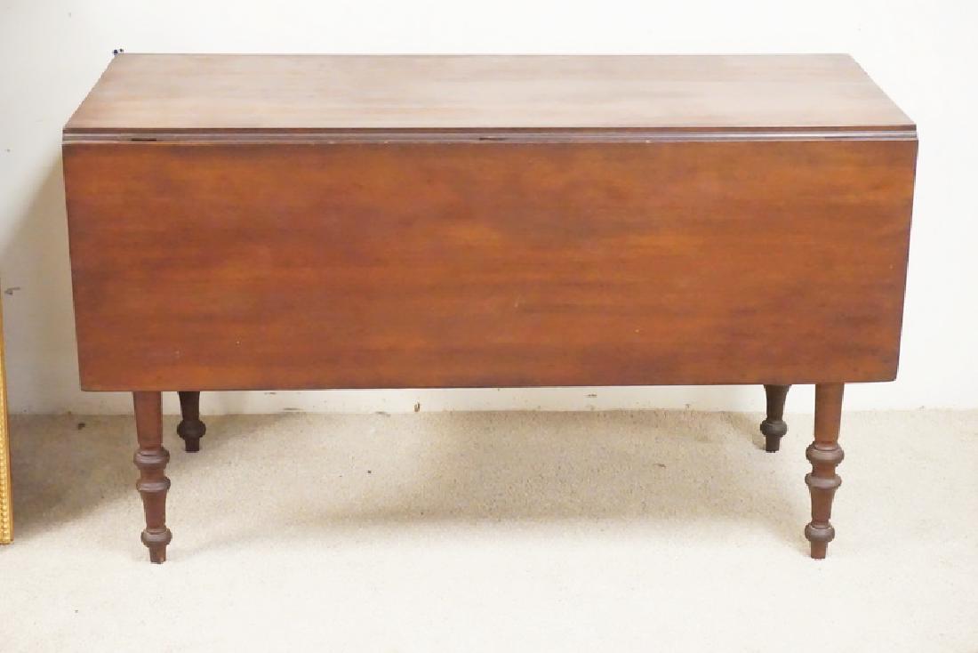 ANTIQUE CHERRY DROP LEAF TABLE WITH TURNED LEGS.: ANTIQUE CHERRY DROP LEAF TABLE WITH TURNED LEGS. 49 X 19 INCH TOP. 28 INCHES HIGH.