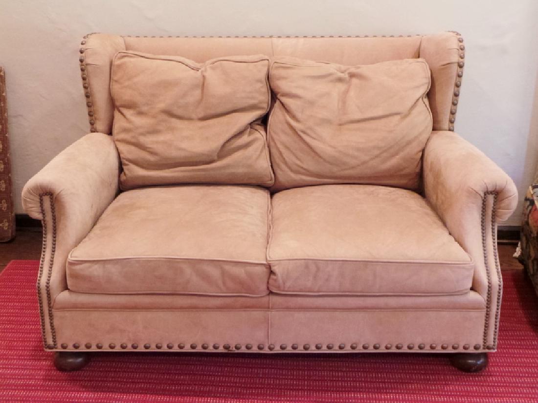 SUEDE LOVESEAT: SUEDE LOVESEAT. 61 INCHES WIDE. 38 INCHES HIGH.