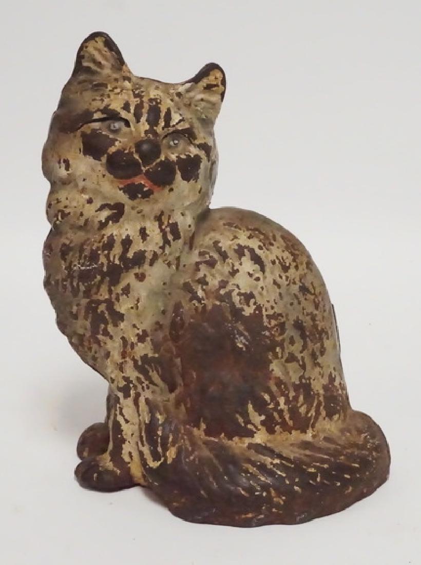 ANTIQUE CAST IRON CAT DOORSTOP.: ANTIQUE CAST IRON CAT DORSTOP. 8 5/8 INCHES HIGH.