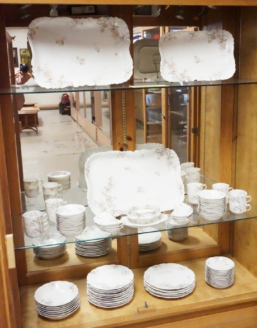 LIMOGES DINNERWARE: 76 PIECE HAVILAND LIMOGES PARTIAL DINNERWARE SET MADE FOR J.M.&W. WESTWATER, COLUMBUS OHIO. LARGEST PLATTER HAS A RIM FLAKE AND IS 18 1/2 X 12 1/4 INCHES.