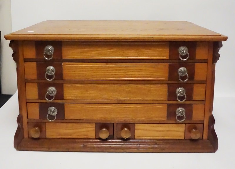 SPOOL CABINET: ANTIQUE OAK SPOOL CABINET. RESTORED. 30 INCHES WIDE. 17 INCHES HIGH. 18 1/4 INCHES DEEP.