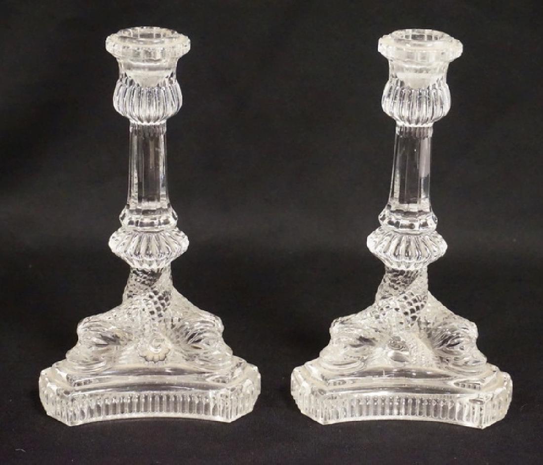 TIFFANY & CO CRYSTAL CANDLESTICKS: TIFFANY & CO CRYSTAL CANDLESTICKS. DOLPHIN BASE. 8 1/4 INCHES HIGH.