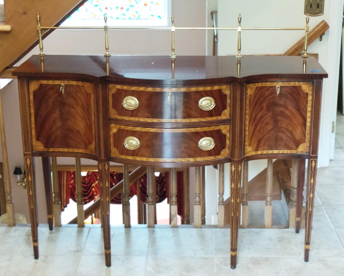 COUNCILL INLAID SIDEBOARD: COUNCILL INLAID AND BANDED MAHOGANY SIDEBOARD WITH BRASS GALLERY. 56 IN WIDE, 47 IN H TO TOP OF GALLERY