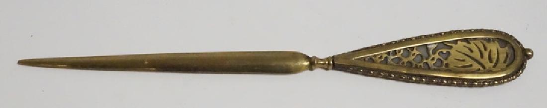 TIFFANY STUDIOS LETTER OPENER: TIFFANY STUDIO BRONZE AND SLAG GLASS LETTER OPENER. 9 1/4 INCHES LONG.