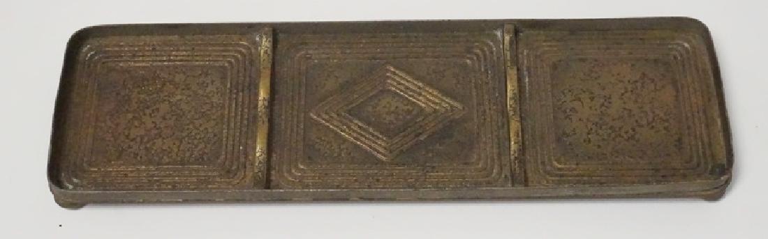 TIFFANY STUDIOS *GRADUATE* PEN TRAY: TIFFANY STUDIOS GILT BRONZE PEN TRAY IN THE GRADUATE PATTERN. 8 5/8 INCHES LONG.