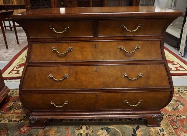 EHAN ALLEN CHEST OF DRAWERS: ETHAN ALLEN BOMBE CHEST OF DRAWERS WITH CARVED FEET. 41 1/2 INCHES WIDE. 18 INCHES DEEP. 36 1/2 INCHES HIGH.