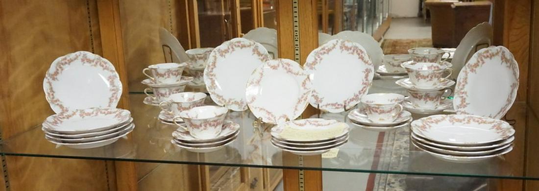 35 PIECE IMPERIAL LIMOGES DINNERWARE: 35 PIECE IMPERIAL LIMOGES CHINA W/GARLANDS OF ROSES AND GOLD TRIM. TWELVE 7 1/2 INCH PLATES, FIVE 6 1/4 INCH PLATES, 7 CUPS AND 11 SAUCERS.