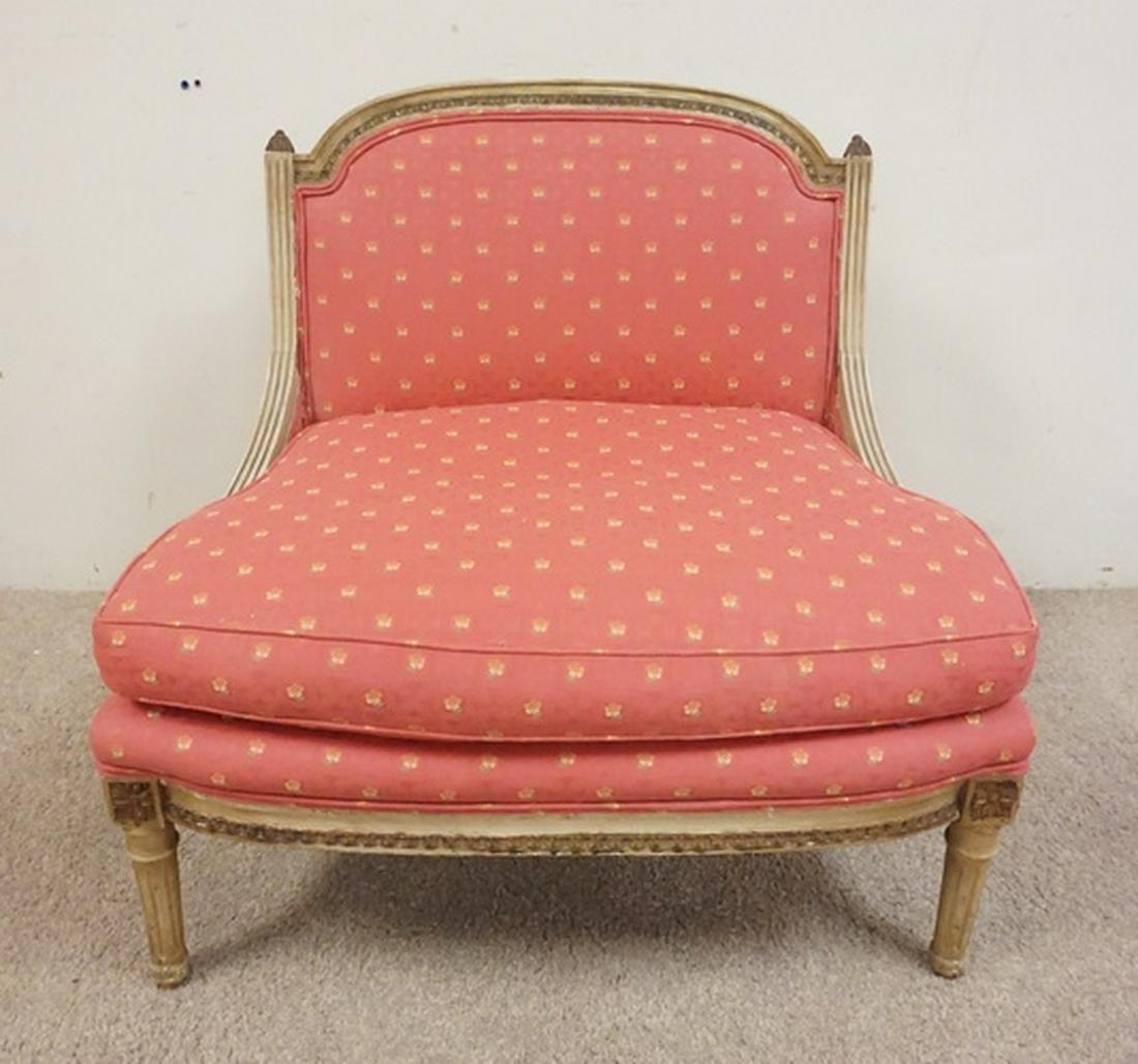 CARVED AND UPHOLSTERED SLIPPER CHAIR: CARVED AND UPHOLSTERED SLIPPER CHAIR. 30 INCHES WIDE. 28 1/2 INCHES HIGH.
