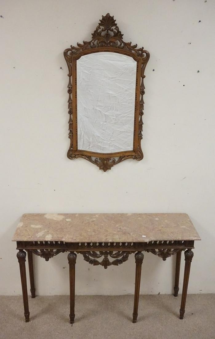 CARVED MARBLE TOP TABLE & MIRROR: CARVED MARBLE TOP CONSOLE TABLE WITH MIRROR. 47 INCHES WIDE. 28 INCHES HIGH.