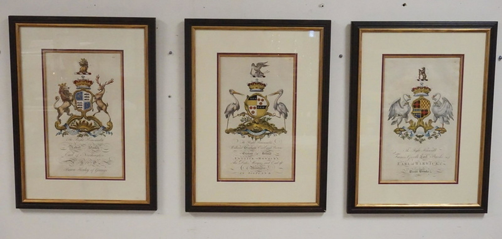 18TH CENTURY COAT ARMS HAND COLORED ETCHINGS: GROUP OF THREE 18TH CENTURY ENGLISH HAND COLORED COAT OF ARMS ETCHINGS ON CHAIN LAID PAPER. INCLUDES FRANCIS GREVILLE EARL OF WARWICK, WILLIAM GRAHAM - GRAHAM OF BELFORD AND EARL OF MONTROSE, AND ROBE