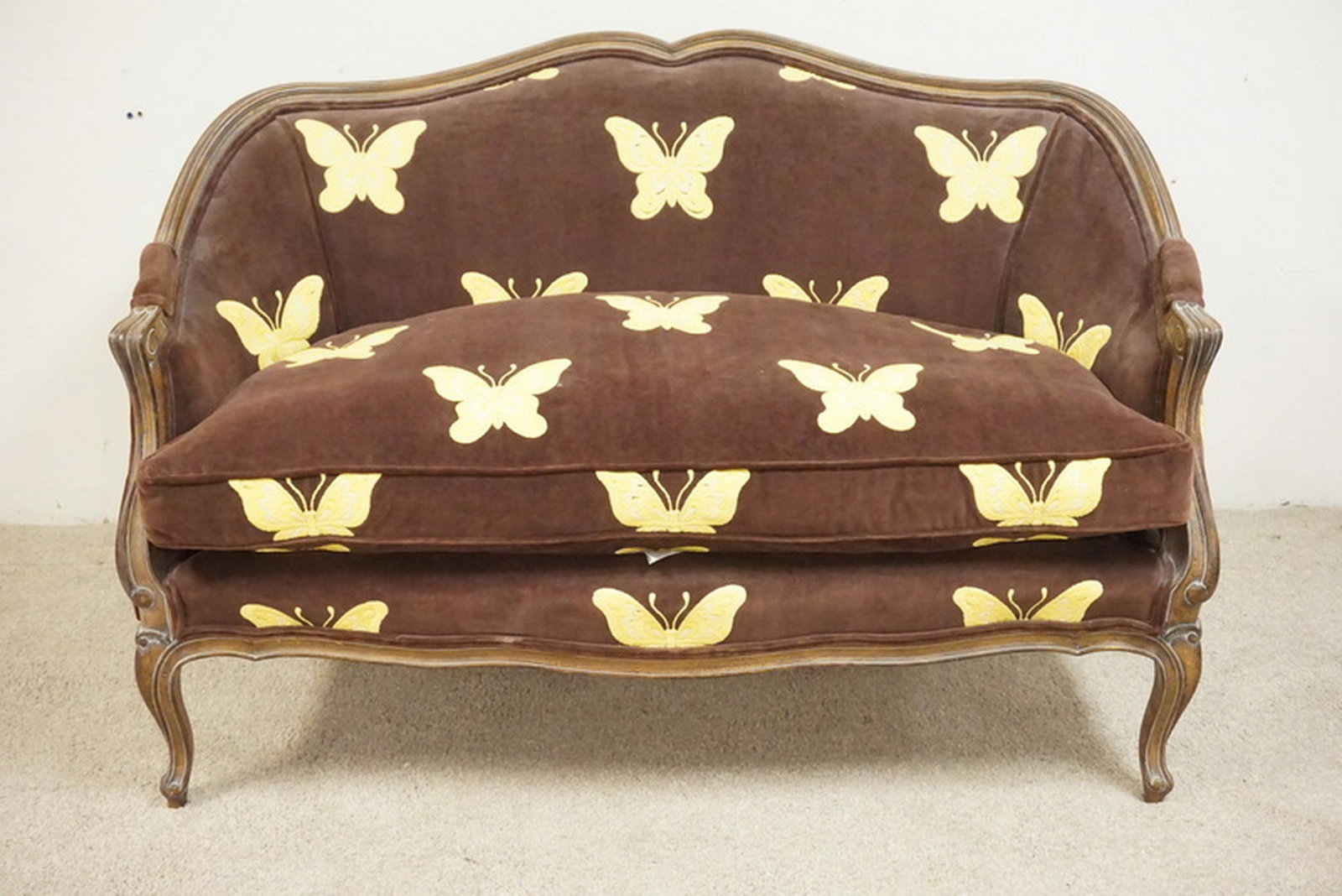 MEYER GUNTHER MARTINI SETTEE: MEYER GUNTHER MARTINI SETTEE WITH BUTTERFLY UPHOLSTERY. 53 INCHES WIDE.