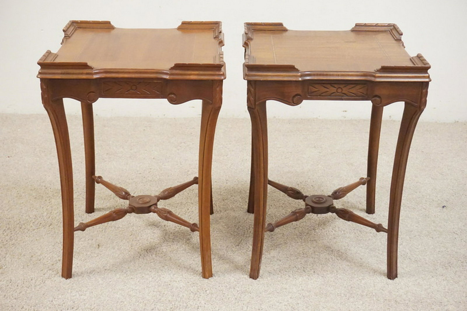 PAIR OF CARVED END TABLES: PAIR OF CARVED AND INLAID END TABLES WITH TURNED STRETCHERS. 23 INCHES HIGH. 17 INCHES SQUARE.