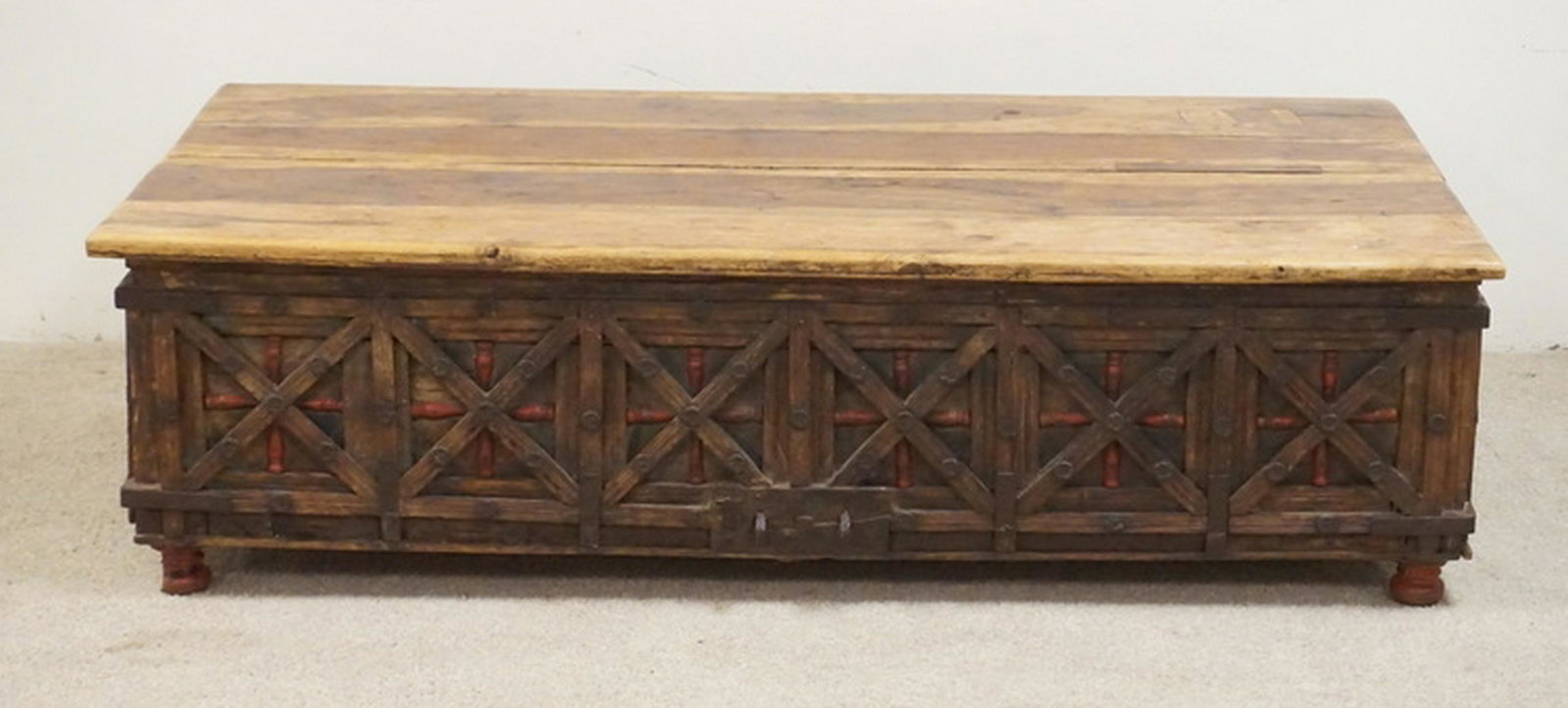 ANTIQUE CONTINENTAL CHEST: ANTIQUE CONTINENTAL CHEST WITH A LIFT TOP, PANELED SIDES, AND IRON HARDWARE. 59 1/2 X 33 INCH TOP. 17 INCHES HIGH.