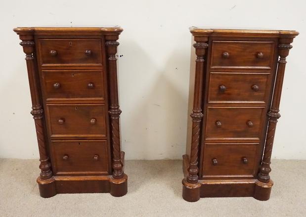 PAIR OF ANTIQUE 4 DRAWER STANDS: PAIR OF ANTIQUE 4 DRAWER NIGHTSTANDS WITH FULL CARVED COLUMNS. 34 INCHES HIGH. 19 INCHES WIDE.