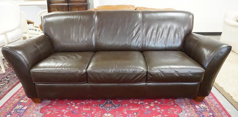 NATUZZI DARK BROWN LEATHER SOFA: NATUZZI DARK BROWN LEATHER SOFA. 87 INCHES LONG.