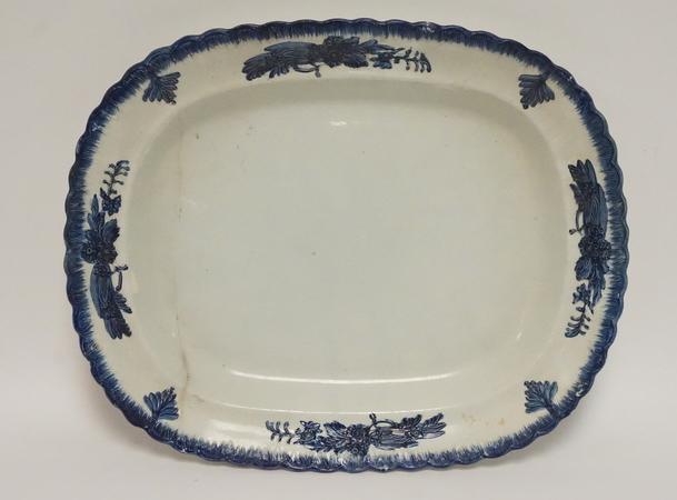 LARGE ANTIQUE LEEDS PLATTER: LARGE ANTIQUE LEEDS PLATTER WITH AN EARLY STAPLE REPAIR. 19 X 15 1/2 INCHES.