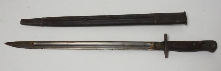 BAYONET: BAYONET WITH SCABBARD. 21 3/4 INCHES LONG.