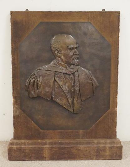 ALICE MEREDITH WILLIAMS BRONZE SCULPTURE: ALICE MEREDITH WILLIAMS BRONZE RELIEF PANEL SCULPTURE OF STALIN. FRAMED IN OAK. SIGNED BY THE ARTIST AND DATED 1928. THE BRONZE PANEL MEASURES 26 1/2 X 31 1/2 INCHES.