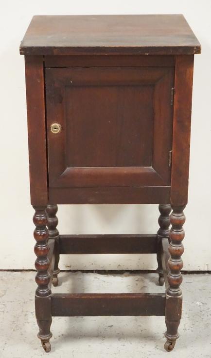 MAHOGANY CASED SAFE: MAHOGANY FLOOR MODEL SAFE WITH COMBINATION. 31 1/2 INCHES HIGH. 15 1/2 INCHES WIDE.