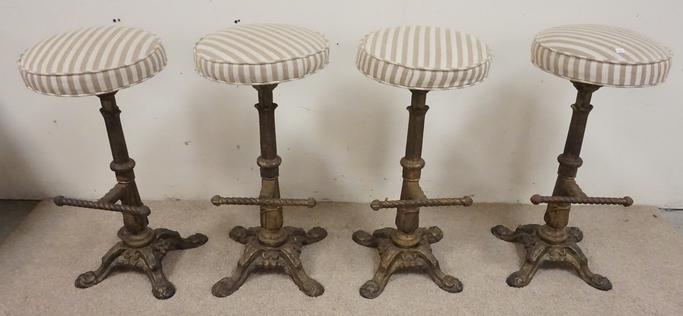 ORNATE CAST IRON BAR STOOLS: SET OF 4 VICTORIAN STYLE BAR STOOLS W/ CAST IRON BASE AND PEDESTAL W/ REVOLVING SEATS