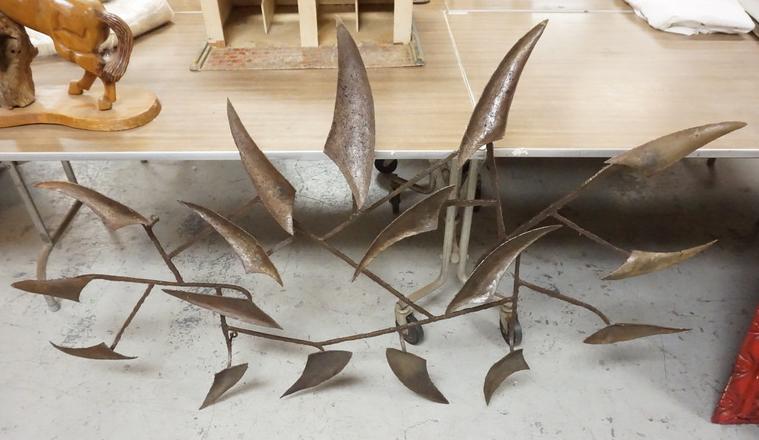 MCM IRON WALL HANGER: MCM IRON WALL HANGER. APP 68 IN X 41 IN