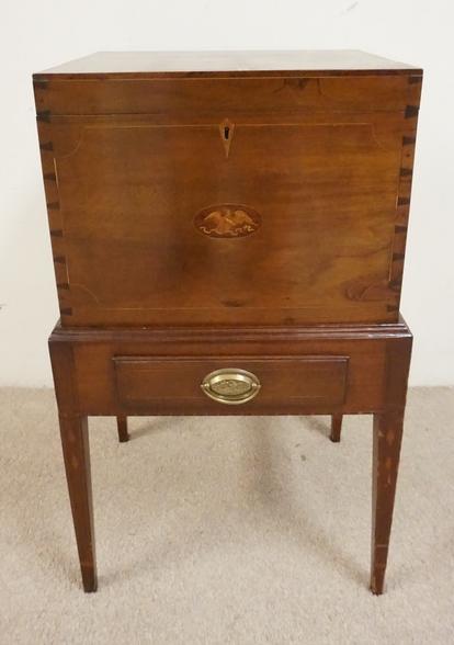 ANTIQUE FEDERAL CELLARETTE ON FRAME: ANTIQUE FEDERAL DOVETAILED CELLARETTE ON FRAME WITH INLAID EAGLE MEDALLIONS. AND A DRAWER IN THE FRAME