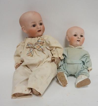 2 NIPPON BISQUE HEAD DOLLS: TWO NIPPON BISQUE HEAD DOLLS, TALLEST IS 13 IN H