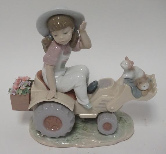 LLADRO PORCELAIN NEED A LIFT?: LLADRO PORCELAIN *NEED A LIFT?*. GIRL ON A LAWN TRACTOR WITH KITTENS.WITH ORIGINAL BOX 8 IN WIDE, 8 IN H