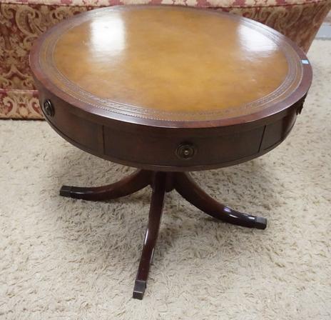 LEATHER TOP DRUM TABLE: MAHOGANY LEATHER TOP DRUM TABLE W/ ONE DRAWER FROM DESKS INC NY