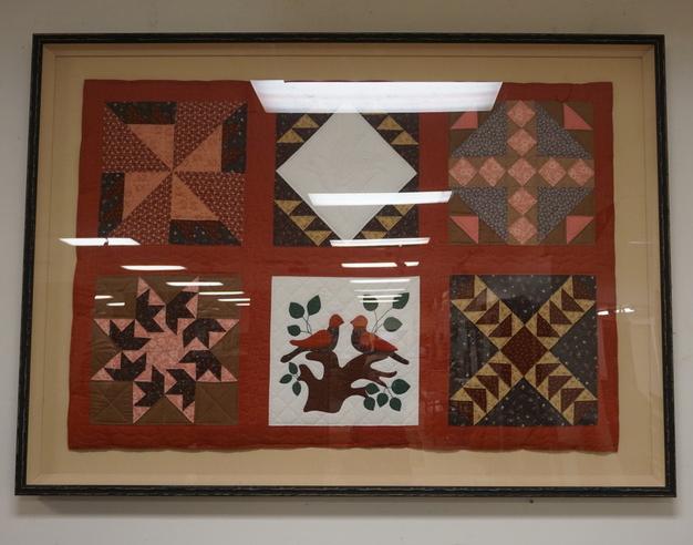 FRAMED CRIB QUILT: FRAMED CRIB QUILT OVERALL DIMENSIONS 65 1/4 IN X 46 IN