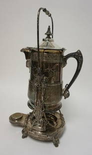 TUFTS SILVER PLATE ICE WATER PITCHER W/STAND: ORNATE TUFTS SILVER PLATED ICE WATER PITCHER WITH SWING STAND. 21 1/4 IN HIGH