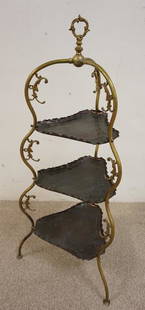BRASS AND COPPER 3 TIER STAND: BRASS FRAMED STAND WITH 3 EMBOSSED TRIANGULAR COPPER TRAYS. 37 IN H