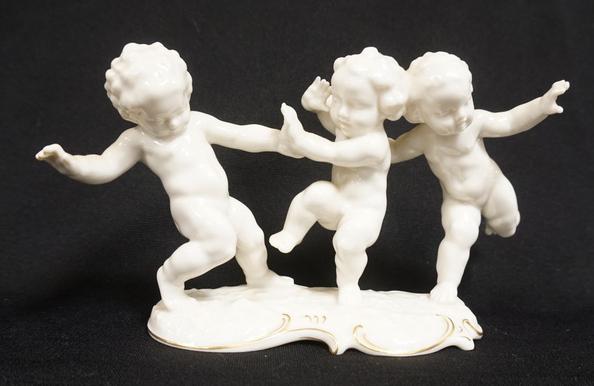 HUTCHENREUTHER PUTI BY K TUTTER: HUTCHENREUTHER PORCELAIN PUTI BY K TUTTER, 8 1/2 IN W 5 IN H