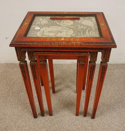NEST OF 3 CARVED PAINTED TABLES: NEST OF THREE CARVED PAINTED TABLES HAVE WOVEN TEXTILE INSERTS UNDER GLASS