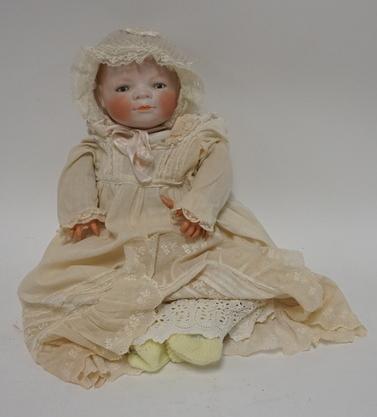 GRACE S PUTMAN GERMAN BISQUE HEAD DOLL: GERMAN BISQUE HEAD BABY DOLL COMMISSIONED BY GRACE S PUTMAN, ONE FINGER NEEDS TO BE REATACHED 17 IN