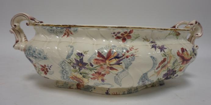 SARREGUEMINES CENTERPIECE BOWL: SARREGUEMINES CENTERPIECE BOWL WITH FLORAL DECORATION. 15 IN ACROSS THE HANDLES 5 3/4 IN H
