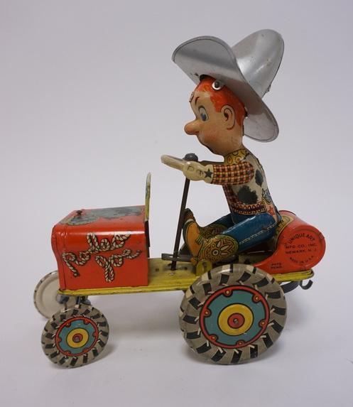 RODEO JOE WIND UP TOY BY UNIQUE ART: RODEO JOE TIN WIND UP TOY BY UNIQUE ART NEWARK NJ 6 3/4 IN LONG, 9 IN H