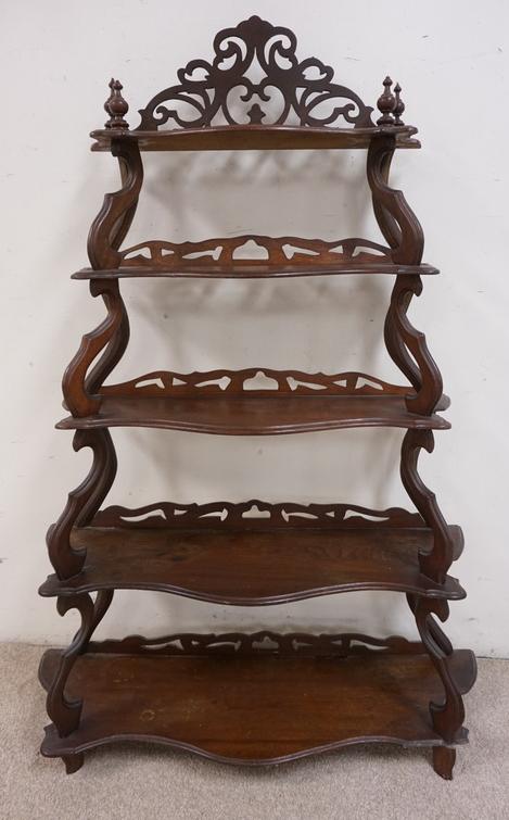 CARVED WALNUT VICTORIAN WHATNOT SHELF: CARVED WALNUT VICTORIAN WHATNOT SHELF W/ FIVE TIERS & A FRETWORK BACK ON EACH SHELF. BOTTOM SHELF HAS LOSSES