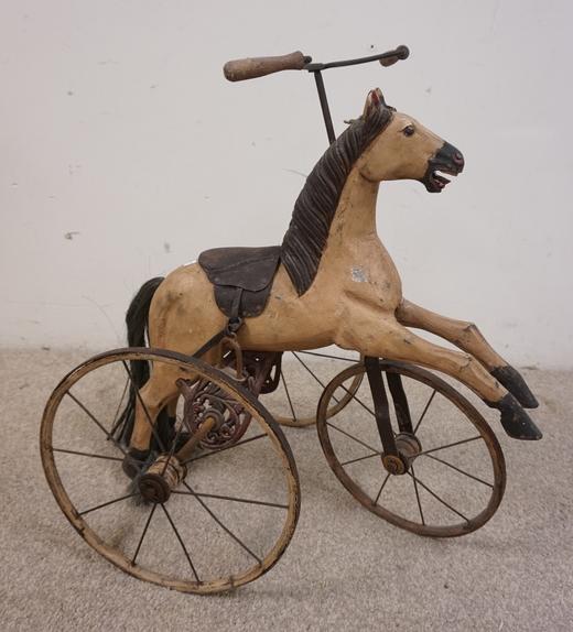 DECORATIVE CHILDS WOODEN TOY HORSE ON WHEELS: DECORATIVE CHILDS WOODEN TOY HORSE ON WHEELS, W/ CAST IRON UNDER CARRIAGE, CONTEMPORARY COPY