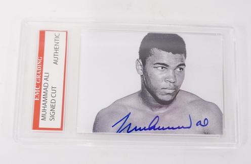 AUTOGRAPHED CUT OF MUHAMMAD ALI: AUTOGRAPHED CUT OF MUHAMMAD ALI, EMC GRADING W/ COA
