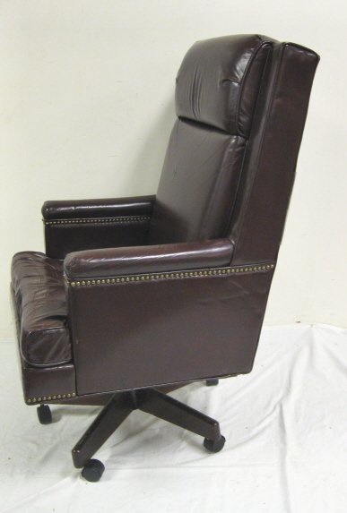 BURGUNDY LEATHER DESK CHAIR; ROCKS & SWIVELS; 48 - 2