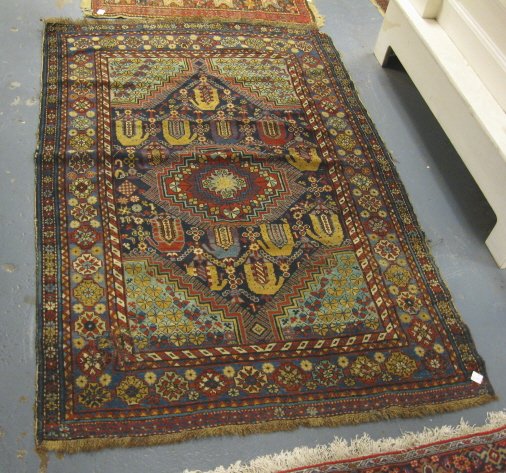 ORIENTAL RUG, 3 FT 8 IN X 5 FT 7 IN; HAS A TEAR I