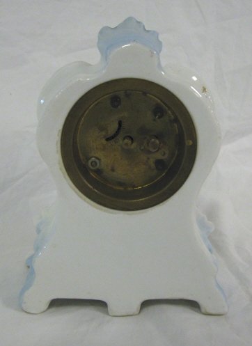 CLOCK; PORCELAIN FLORAL DECORATED CLOCK; 6 1/4 IN - 2