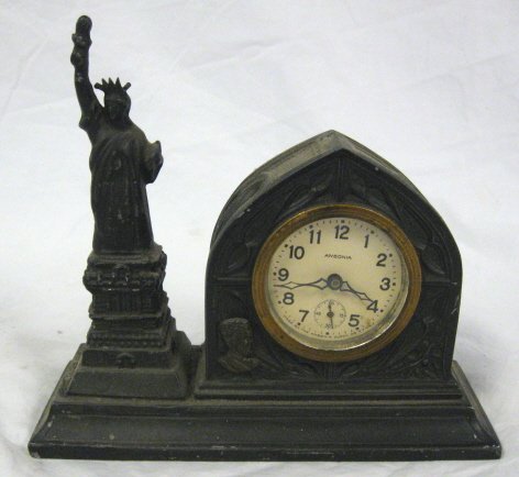 CLOCK; ANSONIA FIGURAL CLOCK OF THE STATUE OF LIB